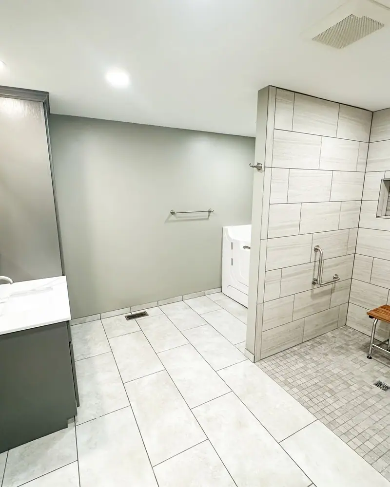 Wheelchair-accessible bathroom addition in Salisbury, MO: curbless shower and open floor space