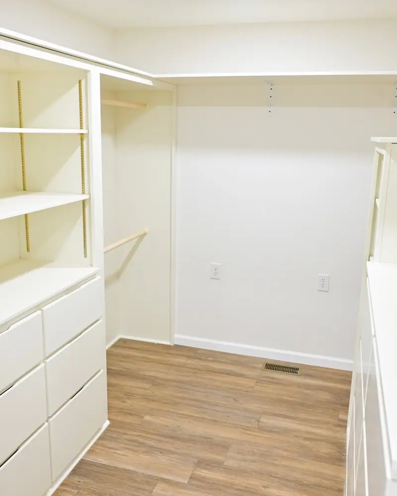 Wheelchair-accessible addition in Salisbury, MO: open walk-in closet with clear floor space