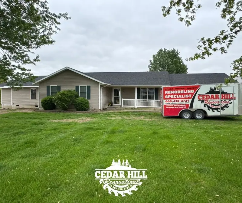 Cedar Hill Renovations trailer at a home addition job site in Salisbury, MO