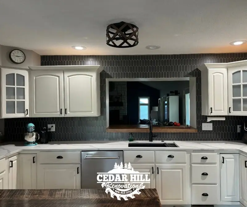 Kitchen backsplash installation in Salisbury, MO: dark tile with white cabinets
