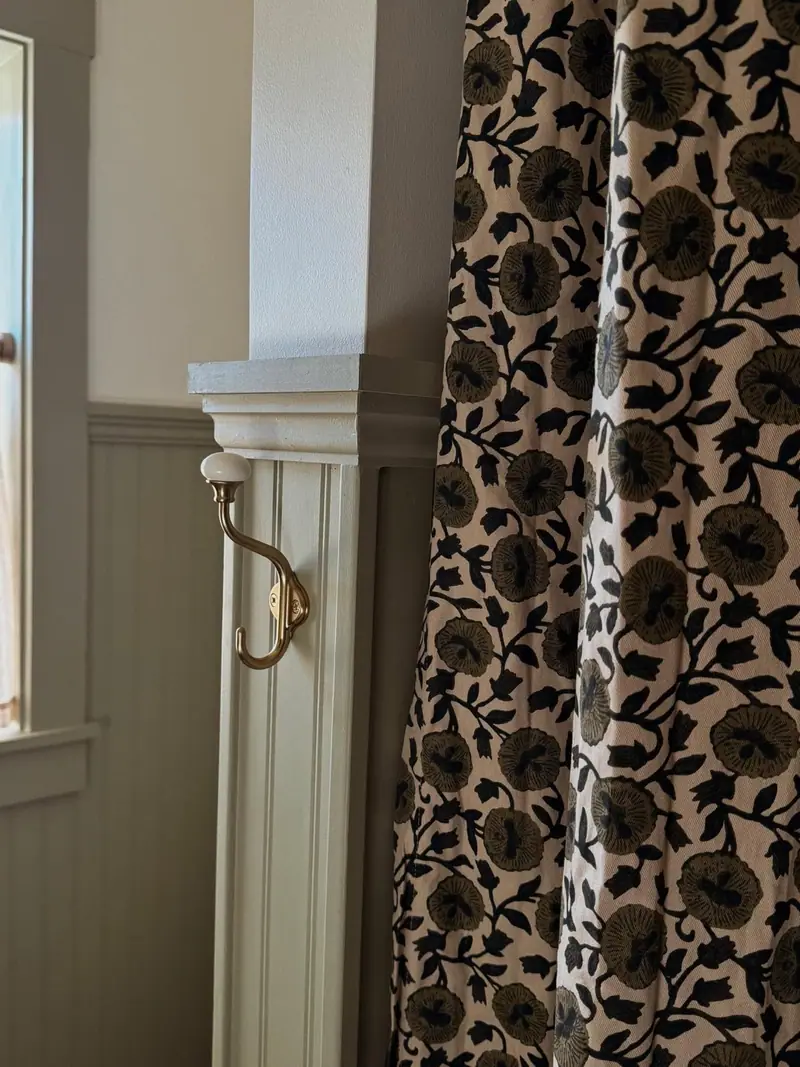 Bathroom remodel in Salisbury, MO: beadboard cap trim and brass hook